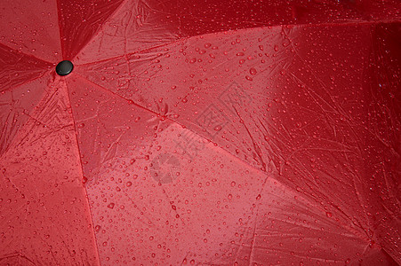 湿雨伞织物拉伸阳伞暴雨辐射飞沫水滴折痕红色庇护所图片