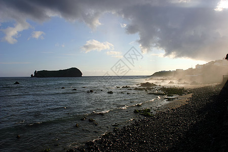 海滩沙滩岛屿天空岩石烟雾海洋波浪海岸蓝色石头图片