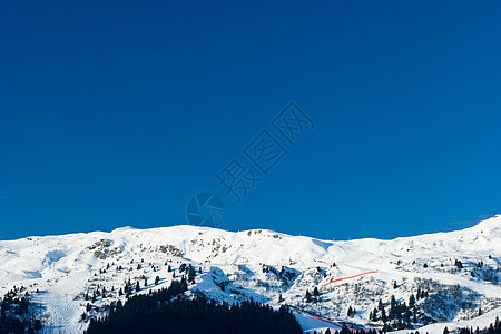 滑雪度假村滑雪板乡村阳光上坡休闲风景城市运动岩石顶峰图片