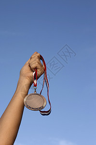 奖金徽章仪式英雄手臂优胜者竞争者比赛天空运动丝带图片