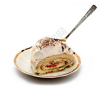 和勺子一块盘上馅饼的切片蛋糕烘烤白色糕点甜点棕色飞碟黑色糖果奶油状图片