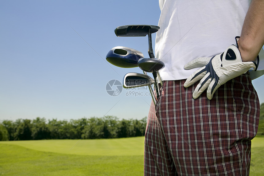 高尔夫俱乐部活动成人消遣时间推杆年轻人俱乐部休息男人青菜图片