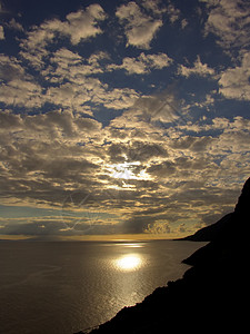 日落橙子海岸海景图层热带海洋天空戏剧性巨浪太阳图片