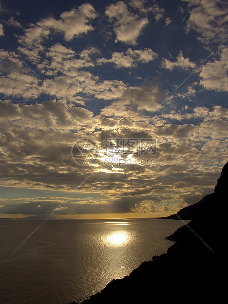 日落橙子海岸海景图层热带海洋天空戏剧性巨浪太阳图片