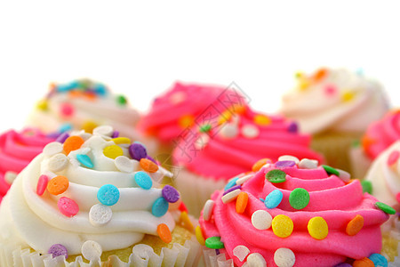 粉红白小吃蛋糕奶油状蓝色小雨庆典绿色甜点黄色白色图片