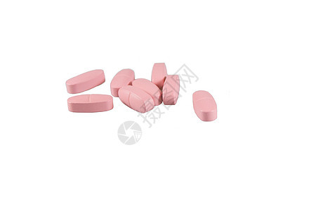 孤立的粉色药丸治愈药品药片背景图片