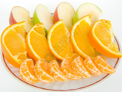 盘子上的水果收获聚宝盆橘子壁球食物背景图片