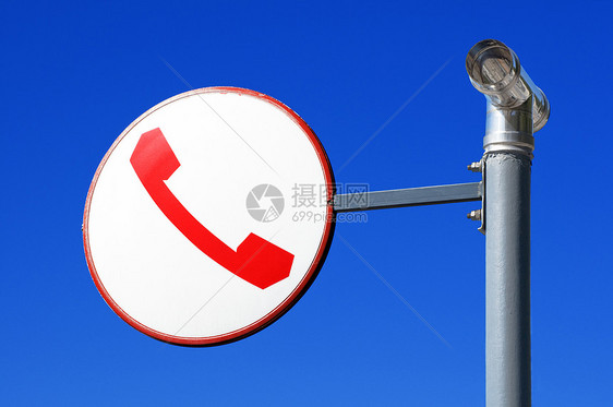 电话号红色民众公用标志白色草图蓝色蓝天天空圆形图片