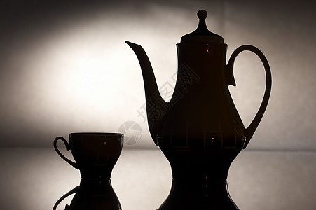 茶壶器皿口渴宏观液体生活白色灰色派对玻璃背景图片