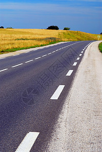 空道路蓝色沥青农田运输缠绕场地肩膀曲线旅行地平线图片