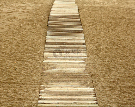 沙地上的路径小路木板出口旅行海洋蓝色棕色木头天堂图片