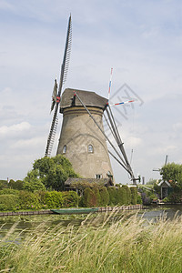 荷兰风车堤防农业旅行旅游小孩图片