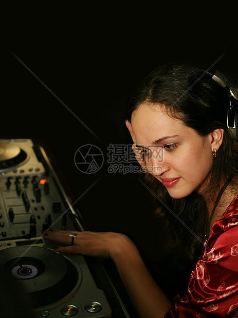 DJ  女孩磁盘喜悦机器人艺人划痕会议乐趣女士技术音乐家图片