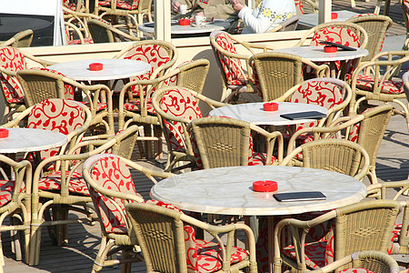 咖啡厅桌椅子藤椅座位沙龙植物木头座套咖啡店烟灰缸地面图片