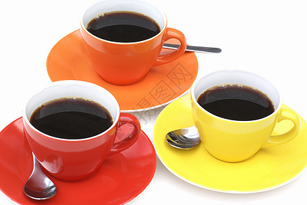 来杯咖啡橙子飞碟红色勺子碟子黑色白色宏观茶具黄色图片