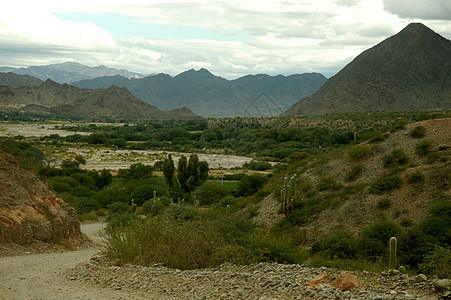阿根廷东北部的离公路路外山坡风景山景植被峡谷山脉岩石土地草地图片