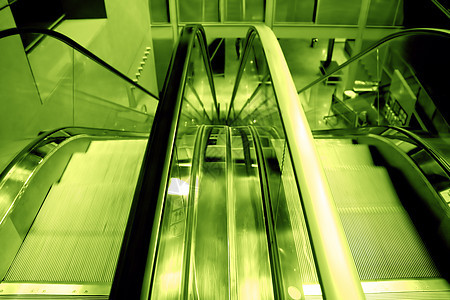 扶梯玻璃地面建筑学通勤者飞机场银行速度城市门厅人行道图片