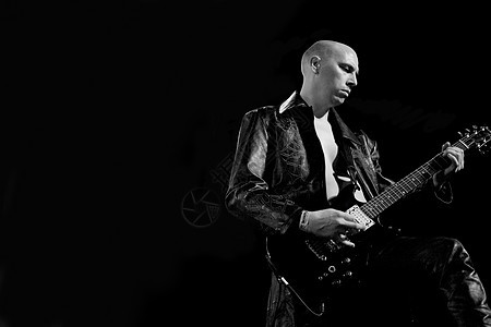 Gig实况音乐会表演光效演奏家男人吉他金属岩石吉他手音乐乐器图片
