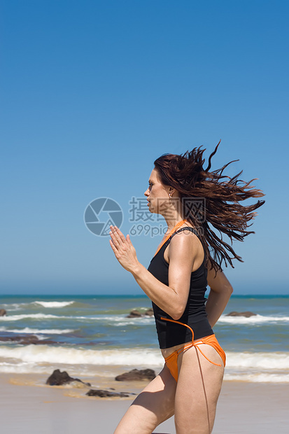 运动模型能力跑步橙子海滩波浪活动力量追求蓝色速度图片