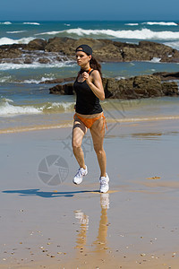 运动模型慢跑橙子跑步海洋天空锻炼行动动机蓝色比基尼图片