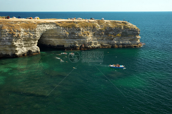 潜水斗篷闲暇海岸线地平线血管乐趣力量假期海浪海景海洋图片