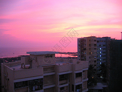 孟买日落大都市房子粉色天空建筑紫色城市图片