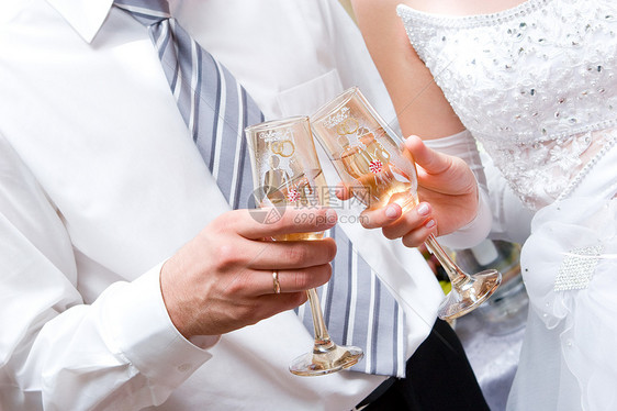 带眼镜的新婚夫妇金子玻璃奢华接待派对周年幸福裙子成功领带图片
