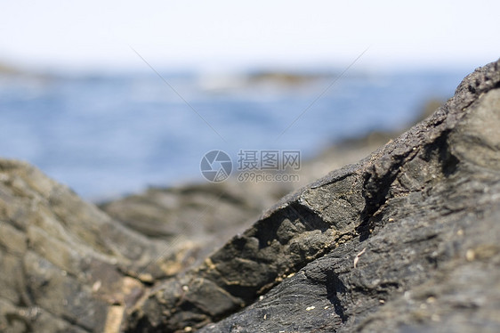 在地中海沿岸的岩石上假期支撑利润洪水陷阱石头废墟喘息图片