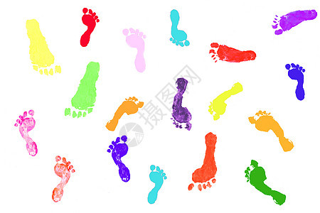 白纸上儿童实际脚印的彩色光影轮廓;图片