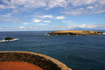 岛屿栅栏荒野海洋红色环境旅行土地风景太阳路面图片