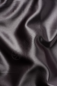 优雅的西边背景柔软度平滑度丝绸曲线银色纺织品折叠天鹅绒黑色热情图片