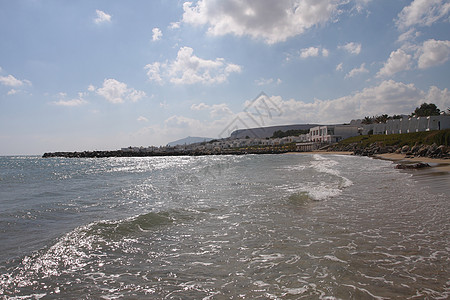 海滩视图太阳热带航海波浪闲暇国家蓝色山脉岩石天空图片