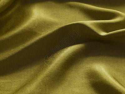 黄色丝绸背景摘要图片
