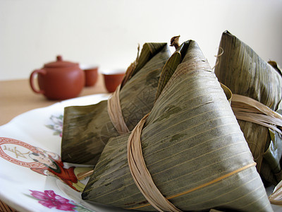 食粮大米糯米文化国际盘子食物茶具场合树叶节日背景图片