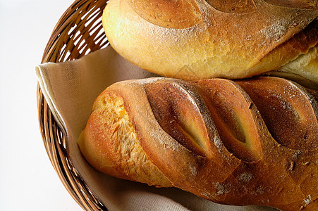 篮子(b2)中多露小麦种成的面包卷图片
