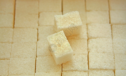 一次包糖糖甜点宏观营养正方形食物白色水晶美食背景图片