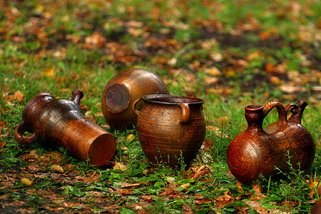 泥土中的水壶陶工艺术瓶子花瓶陶器黏土仓库粘土棕色创造力图片