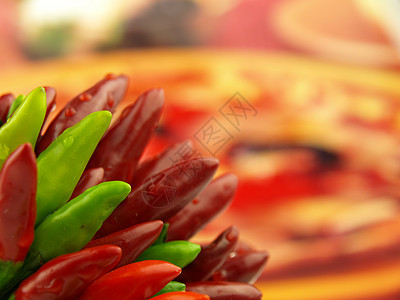 辣椒辣椒和热红辣椒非常贴近食物辣椒橙子烧伤胡椒蔬菜红色燃烧图片