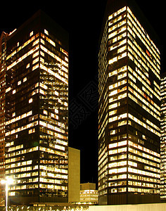 大市中心蓝色办公室城市建筑点燃摩天大楼建筑学工作天空图片