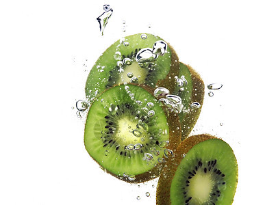 kiwi 飞水果汁飞溅水果气泡背景图片