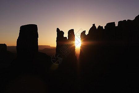 古迹谷地的日落景色旅游照片旅行峡谷太阳沙漠水平岩石风景日出图片