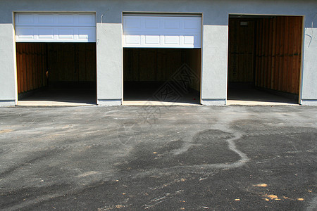 正在施工中的停车场入口房地产工业木头石头建筑车库品牌水泥灰色背景图片