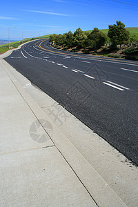 无限道路水泥路线驾驶旅行季节速度车道航程蓝色晴天图片