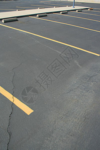 停车空间灰色黄色沥青汽车停车场路面运输背景图片