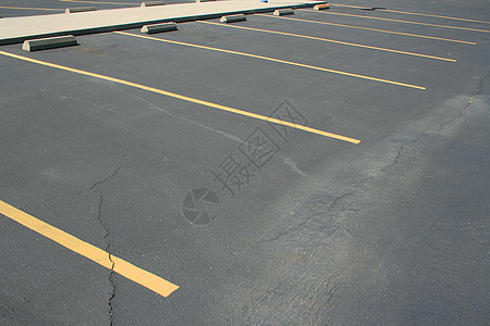 停车空间停车场运输灰色路面黄色沥青背景图片
