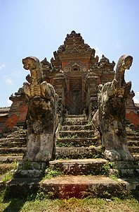 印度尼西亚巴厘寺庙庆典游客雕像女神传统旅游蓝色寺庙旅行衣服图片