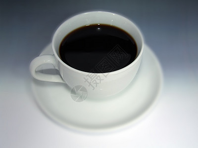 白咖啡杯中的黑咖啡香气巧克力盘子早餐餐厅桌子杯子牛奶奶油咖啡图片