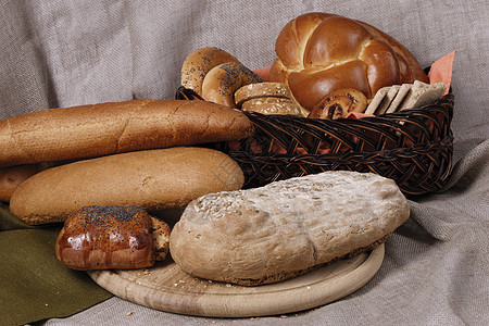 各种面包小麦营养品食物午餐硬皮篮子面粉早餐糕点包子背景图片