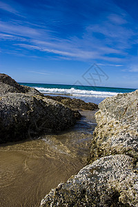 黄金海岸海滩破坏冲浪热带海洋海景蓝色天空旅游阳光海岸图片