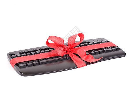 圣诞节礼物键盘丝带展示白色惊喜黑色乐队环形磁带红色图片